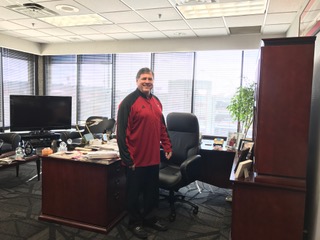 Tom in his university office