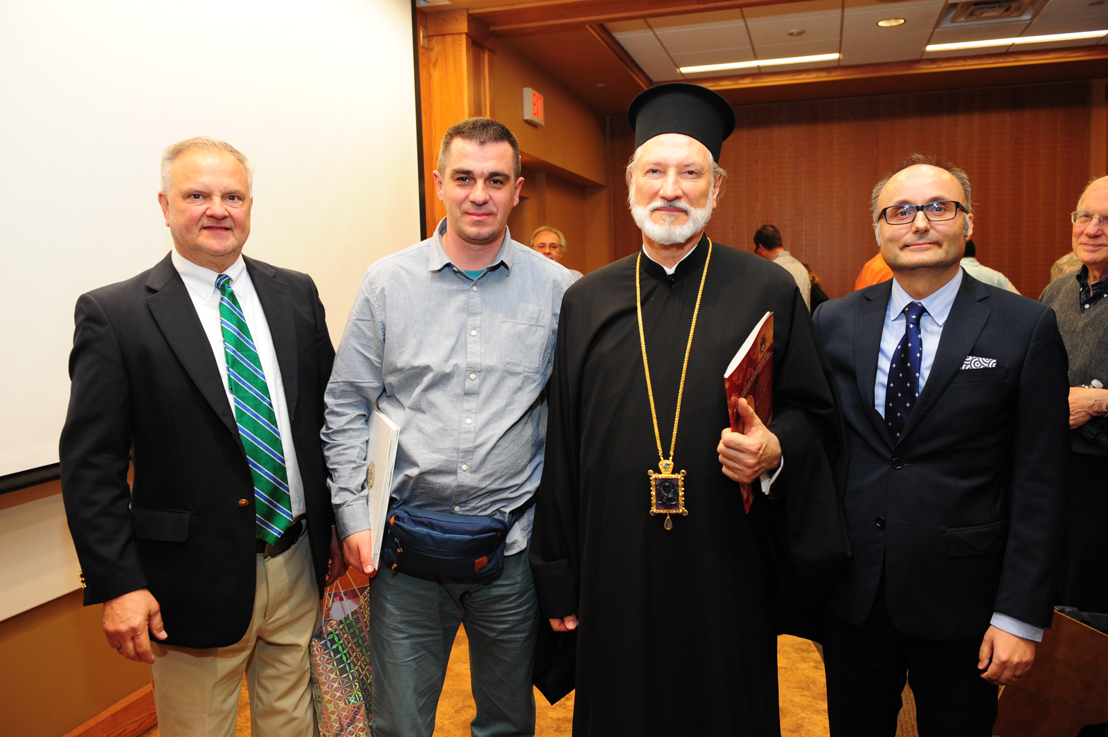(from left to right) After the Award Ceremony: John Martich, Zeljko Mirkovic, H.G. Bishop IRINEJ, and Milos Rastovic