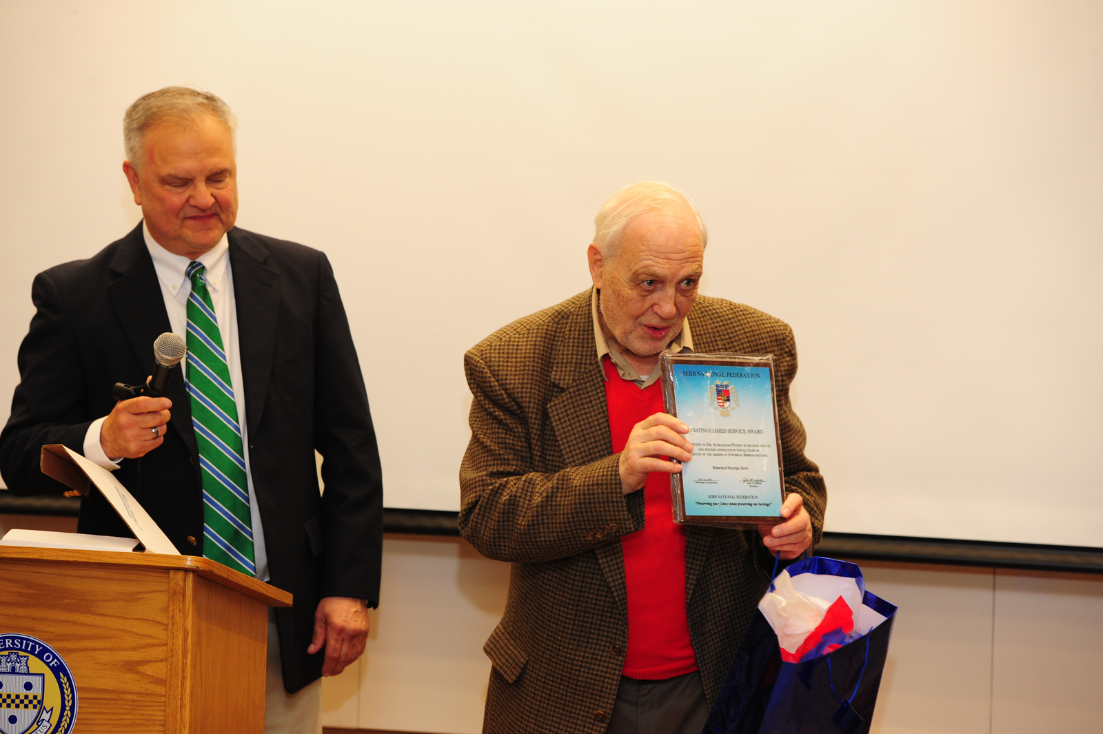 John Martich, the President of the SNF, awarded Dr. Aleksandar Petrov with SNF Distinguished Service Award